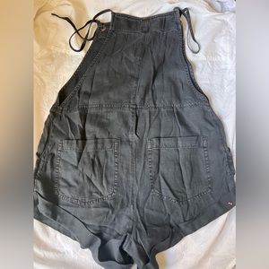 Blackish- greyish Romper with spaghetti straps.